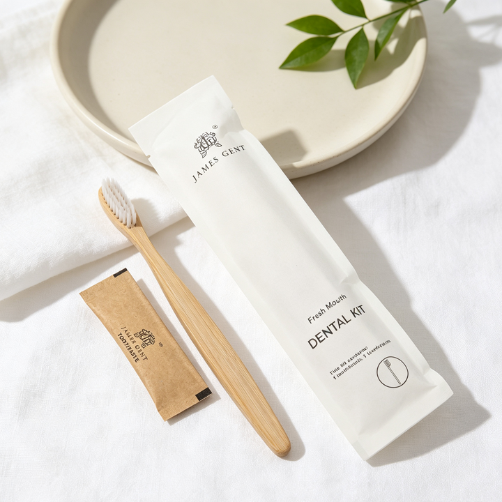 A Jambu Gunt Fresh Mouth Dental Kit set arranged on a white fabric surface