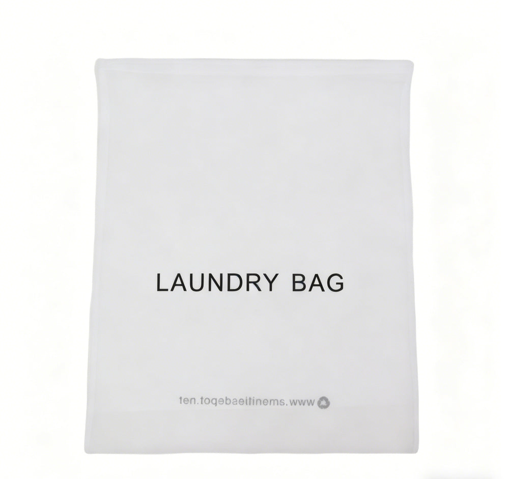 White non-woven laundry bag with 'LAUNDRY BAG' text on a white background