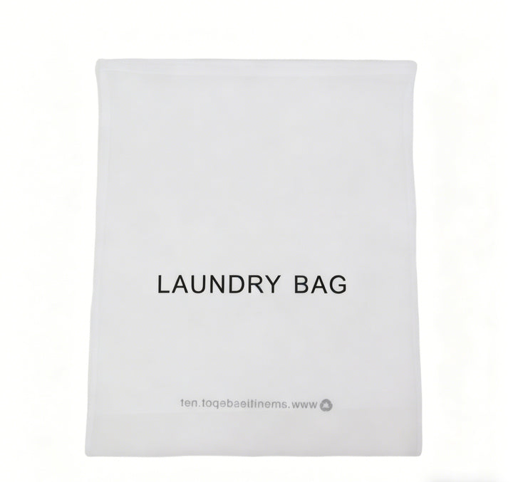 White non-woven laundry bag with 'LAUNDRY BAG' text on a white background