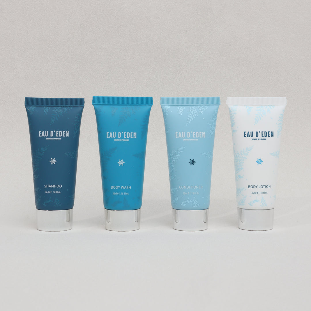 Set of  EAU D'EDEN skincare products on a gray background